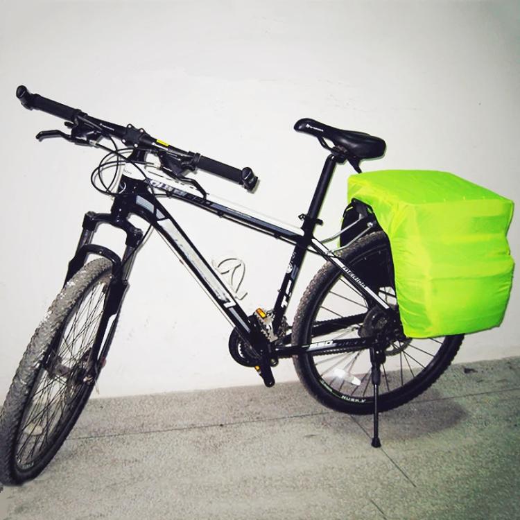 Neon green pannier cover fitted on rear rack with black trim and drawcord