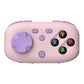 Pink mini pocket Bluetooth game controller with lavender left joystick and face buttons