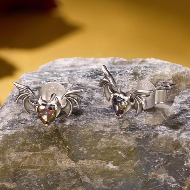 Sterling silver bat stud earrings with heart-shaped purple gemstone and post backs
