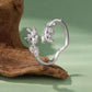 Sterling silver open ring with green agate leaf center and sparkling crystal accents