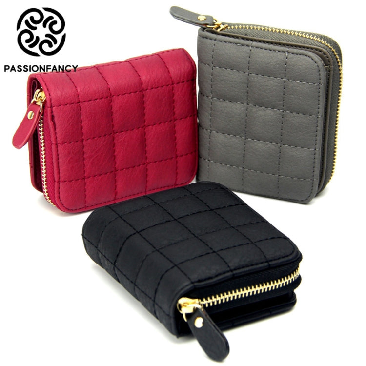 Quilted mini coin purses in red and dark grey with short zip closure, gold pulls