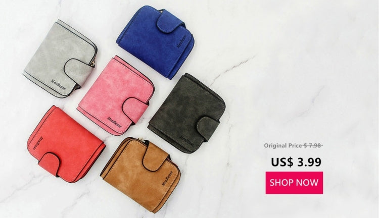 Assorted quilted mini coin purses with short zippers in blue, pink, green, black, and tan