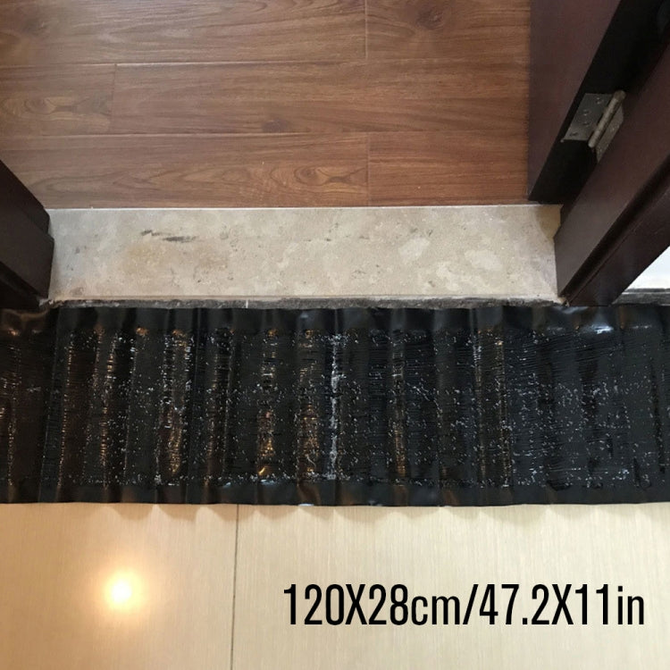 Long black rodent glue trap board with textured adhesive surface