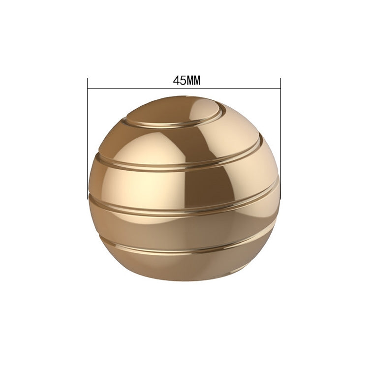Gold rotating tabletop ball gyroscope toy, 45mm diameter, domed metal shell.