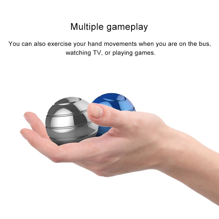 Rotating tabletop ball gyroscope toy set showing blue and silver metal domes in hand.