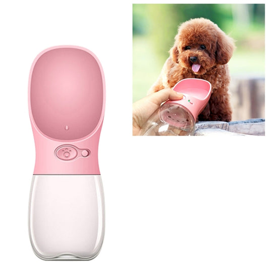 Pink portable pet water bottle with flip-up drinking cup and translucent water reservoir