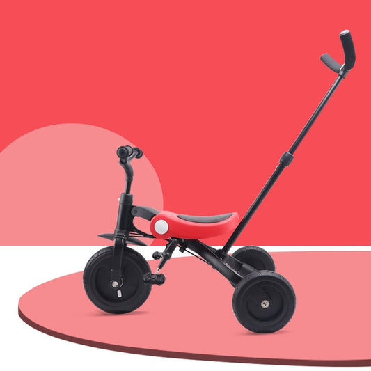 Baby tricycle with three wheels, red seat, and black frame with curved handlebar