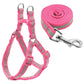 Pink reflective nylon dog leash and harness set with metal clasp and coiled strap