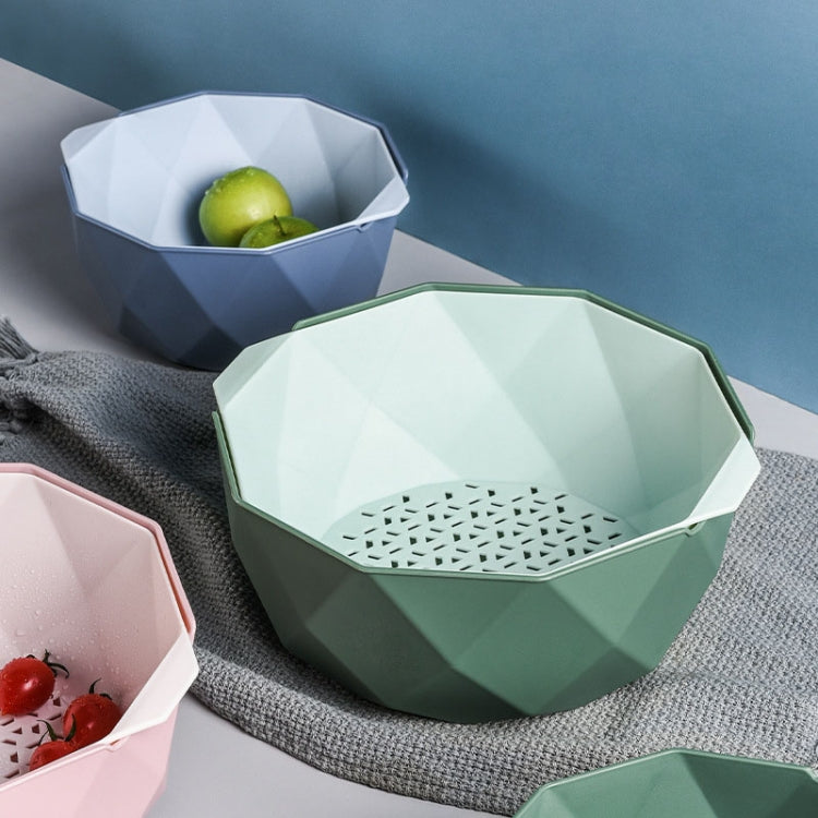 Green double-layer drain basket with perforated base, empty