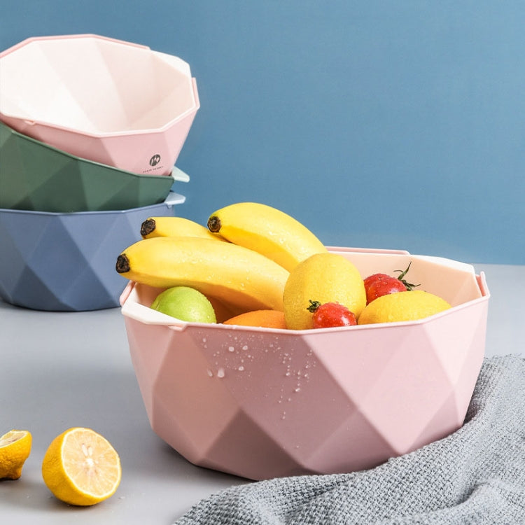 Pink double-layer drain basket with lemons and fruit