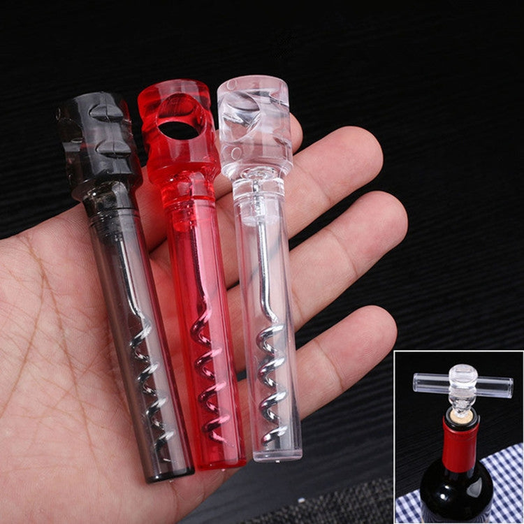 Assorted color wine corkscrews: red, clear, and dark with spiral worm