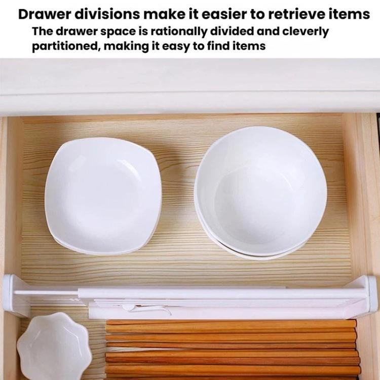 White drawer divider system with two raised partitions inside an organizer drawer.