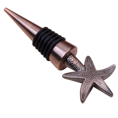 Metal wine stopper with bronze starfish finial