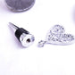 Metal wine stopper with silver heart-shaped charm