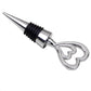 Metal wine stopper with silver heart-shaped charm