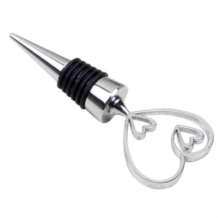 Metal wine stopper with heart-shaped loop handle, black ribbed collar, silver finish.