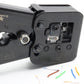 Close-up of cable termination tool port showing exposed contacts and colored wire leads