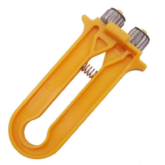 Yellow plastic beekeeping nest box tightener tool with spring and roller wheels