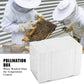 White foam pollination box in front of beekeepers holding a filled frame outdoors
