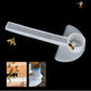 White bee water feeder door cap on a long tube, angled for access