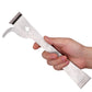 Stainless steel honey scraper knife held in hand, showing thumb rest and blade edge
