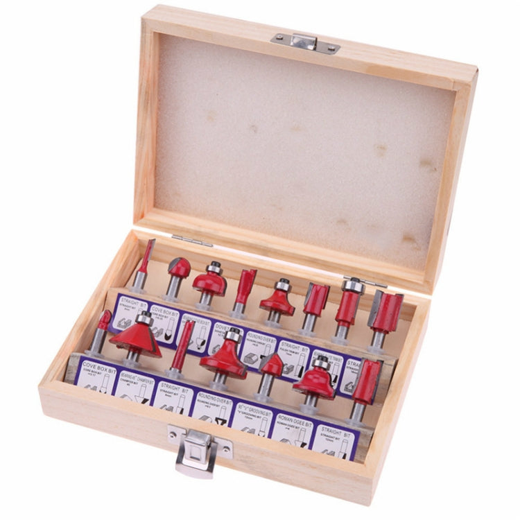 Wood router bit set in wooden organizer case with red carbide cutting bits