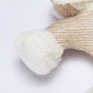 Cream plush dog chew toy close-up with textured fabric and soft plush detail