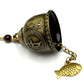 Bronze hanging bell with Buddha motif, fish charm, and chain links