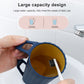 Blue ribbed cup with handle and built-in toothbrush bristle slot opening.