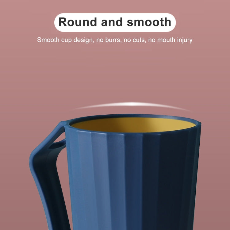 Blue ribbed cup with handle and smooth rim, rounded top opening.