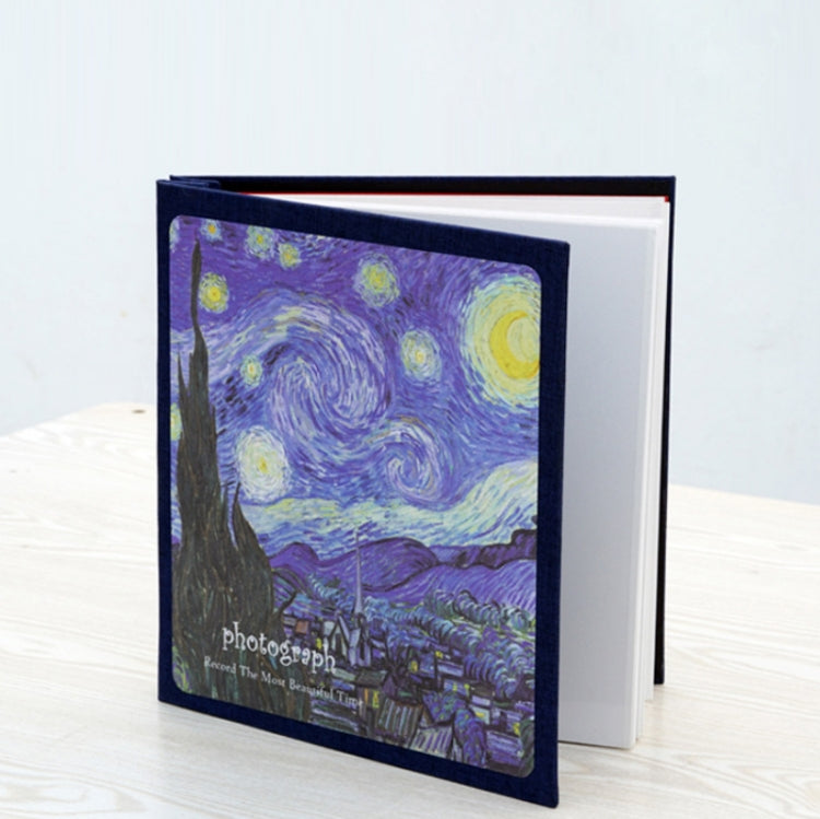 DIY photo album with starry night cover and white spine, shown closed