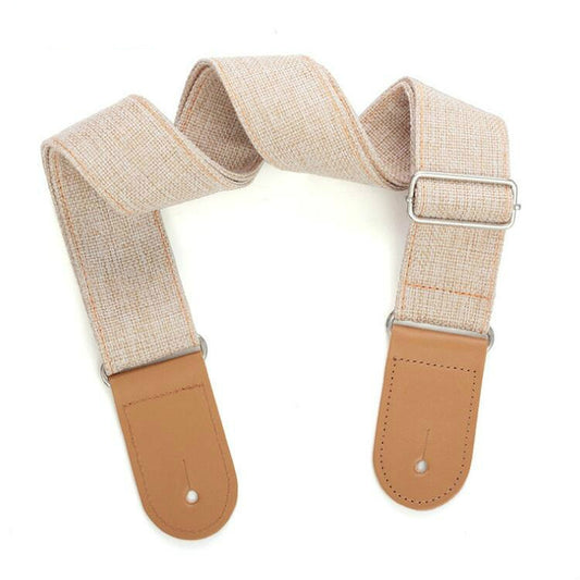 Adjustable cotton-linen guitar strap with tan leather end tabs and silver buckle