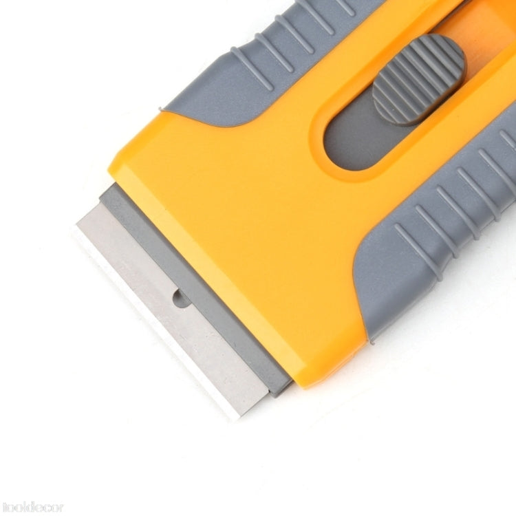 Plastic-handled razor blade scraper, close-up of exposed metal blade