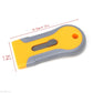 Plastic-handled razor blade scraper with size markings and yellow-gray design