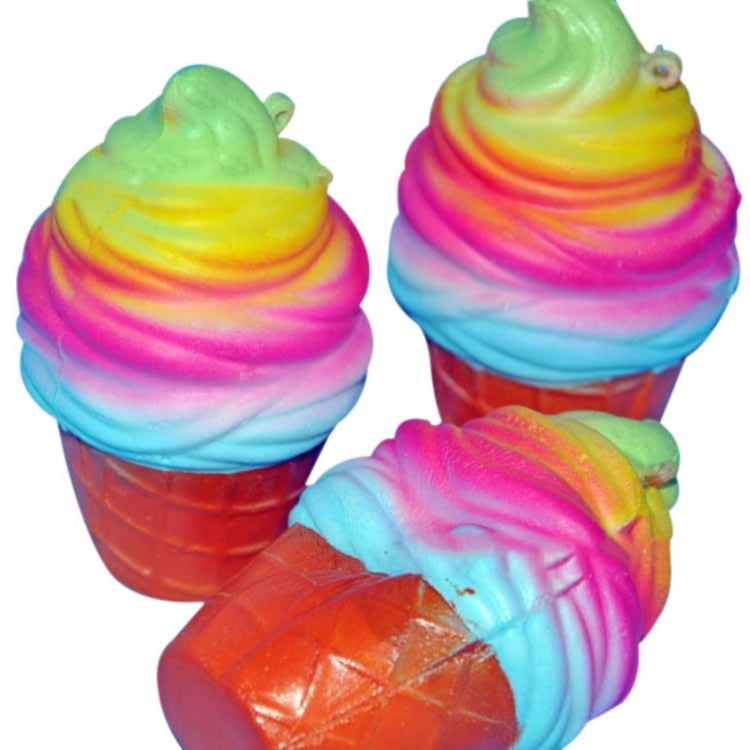 Set of two rainbow swirl ice cream cone squishy toys, orange cones and green-pink-blue tops.
