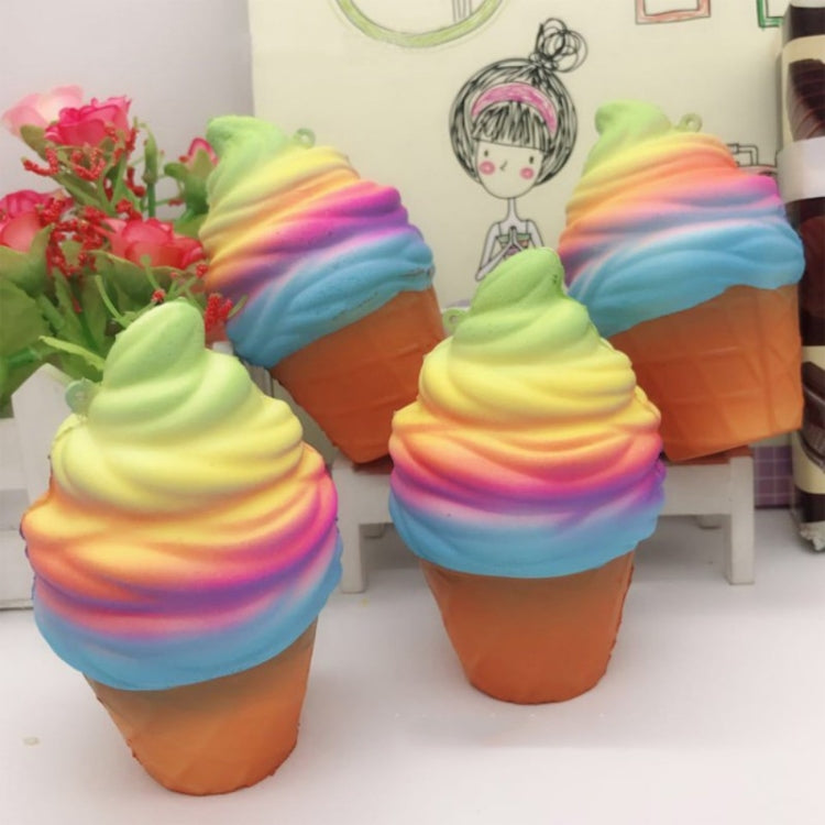 Four rainbow ice cream cone squishy toys with orange cones and multicolor swirled tops.