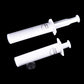 Two white venom extractor suction syringes with flanged tips for emergency use