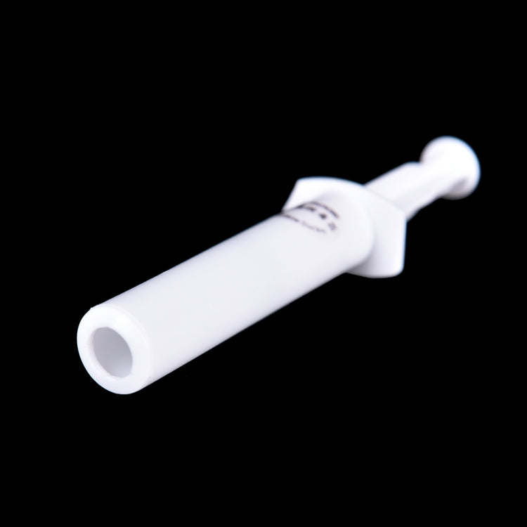 White venom extractor syringe close-up with printed measurement marking