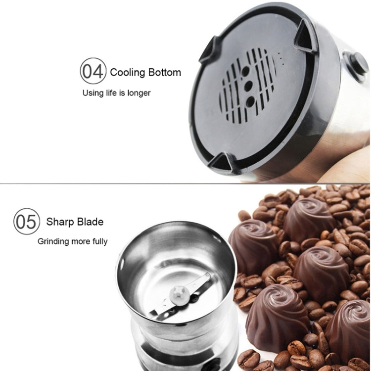 Stainless electric grinder with vented underside and inner blade cup, shown with coffee beans