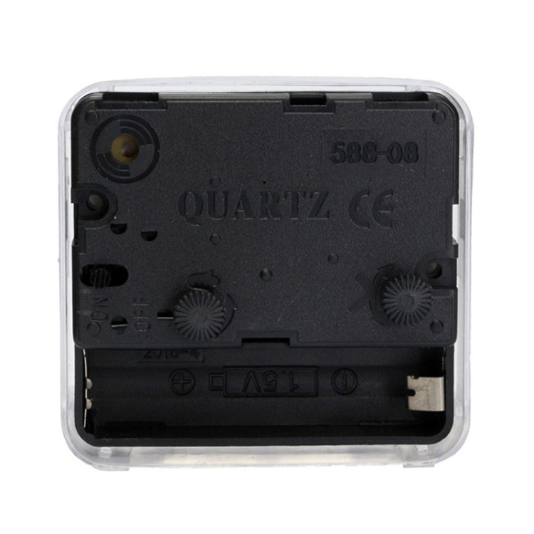Square quartz alarm clock rear view inside transparent case with battery panel