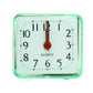 Square quartz alarm clock with transparent green case, white dial and red center hand