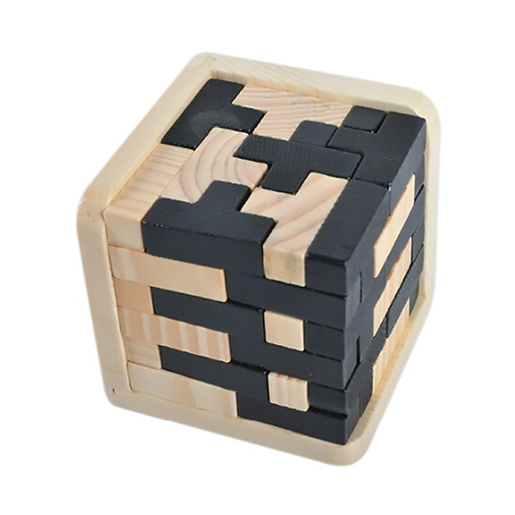 Wooden interlocking puzzle cube with black and light wood block pieces, assembled view