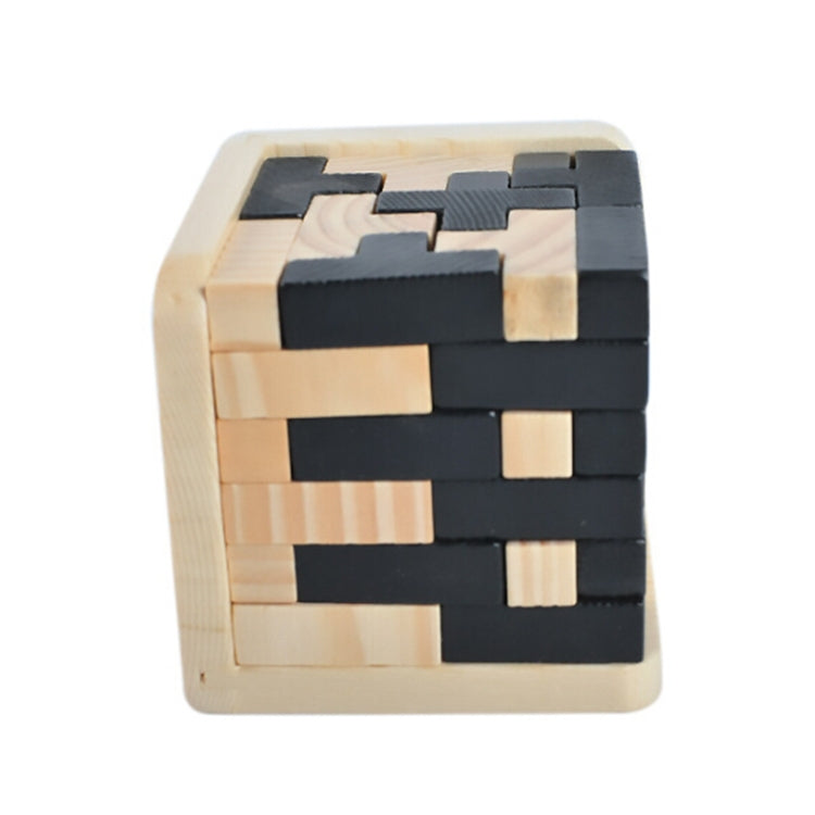 Wooden interlocking puzzle cube with light wood frame and black block pieces, assembled