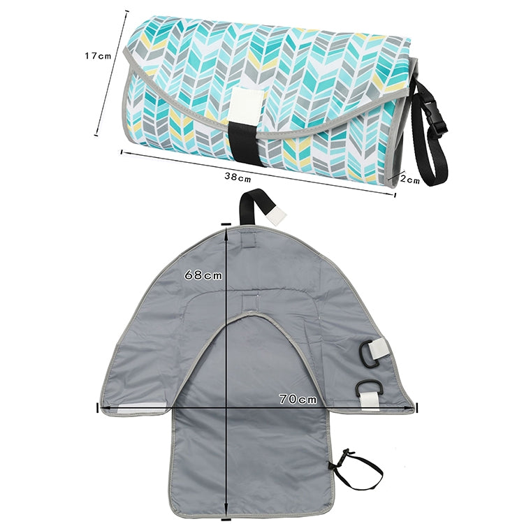 Portable folding waterproof changing pad set, leaf-print cover with gray base and straps.