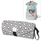 Folding waterproof changing pad, black and white geometric pattern with carry strap.