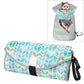 Folding waterproof changing pad, aqua and yellow leaf pattern with carry strap.