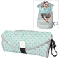 Folding waterproof changing pad, pale green with pink dot pattern and carry strap.