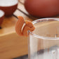 Silicone squirrel cup charm, orange squirrel on clear glass rim