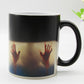 Color-changing ceramic coffee mug with red handprint graphic and black top band, black handle