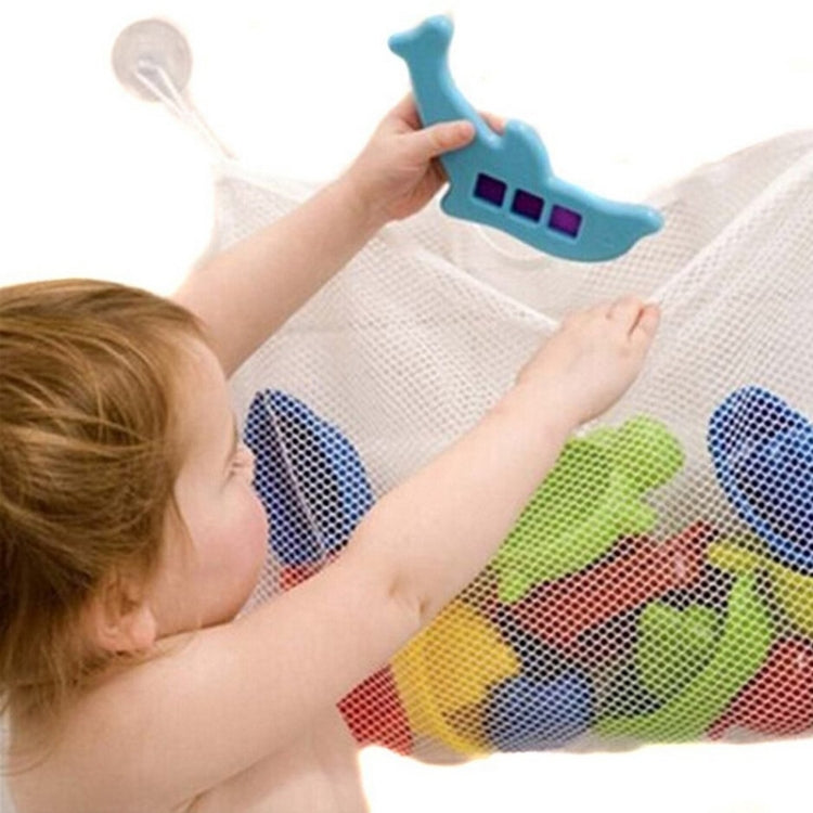 Baby toy hanging organizer net bag with suction cups, toys being placed inside.